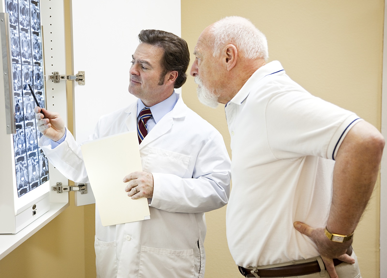 doctor telling patient his FCE test results