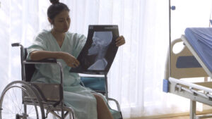 woman looking at slip and fall brain injury x-ray in Nevada