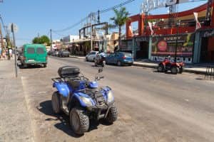 an ATV is parked on the street