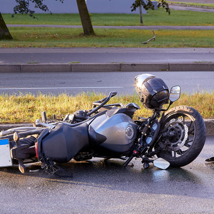 Motorcycle laying in Las Vegas street after crash